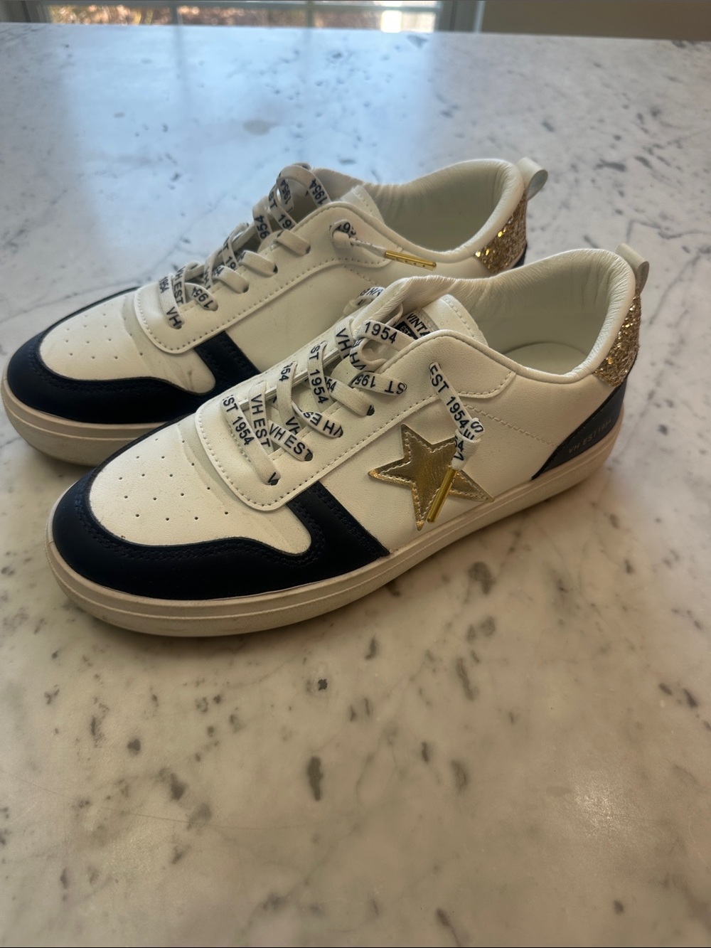 Vintage Havana White Black Sneakers with Gold Star Accent